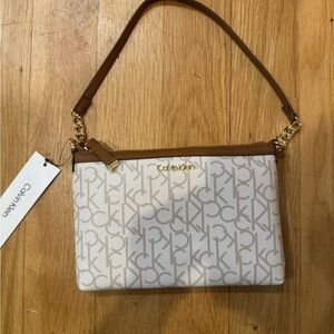 Calvin Klein Tan and White Logo Wristlet